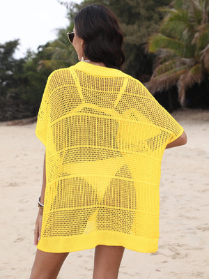 Yellow open-knit polo beach dress with short sleeves and a relaxed fit, worn over a matching swimsuit.