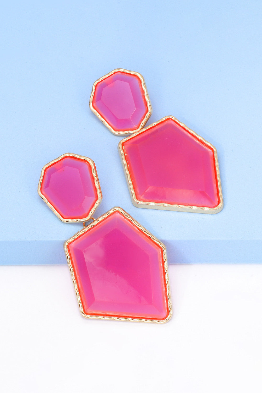 Hot Pink resin facet drop earrings with gold trim, abstract shape, casual style.
