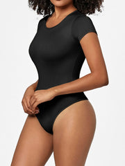 Black short sleeve scoop neck bodysuit with a thong bottom.