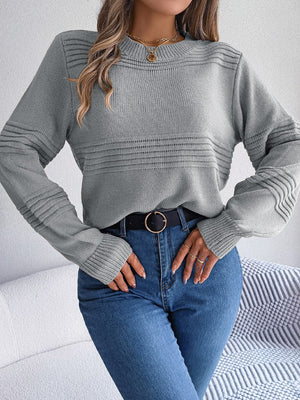 Dark gray ribbed yoke knit sweater with crew neck and textured sleeves.