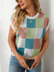Checkerboard knit cap sleeve top in pastel blocks of pink, blue, green, and white.
