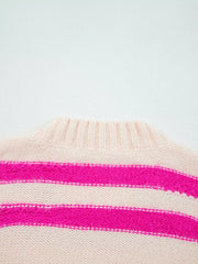 Cream and hot pink striped acrylic crew neck sweater with fuzzy texture.
