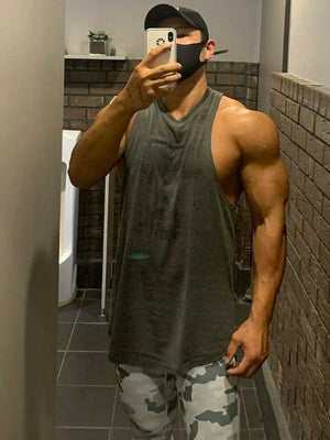 Gray washed cotton blend muscle tank top with a deep V-neck.