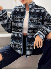 Textured Aztec zip-up fleece jacket in dark blue with a stand-up collar and full zipper.