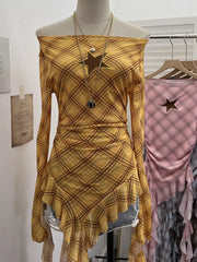 Yellow plaid asymmetrical ruffle hem t-shirt with star cutout detail.