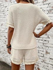 Cream textured knit set with fringe detail on short sleeves and shorts.