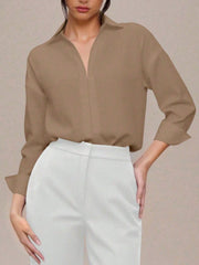 Khaki long sleeve collared bodysuit with a deep V-neckline, cuffed sleeves.