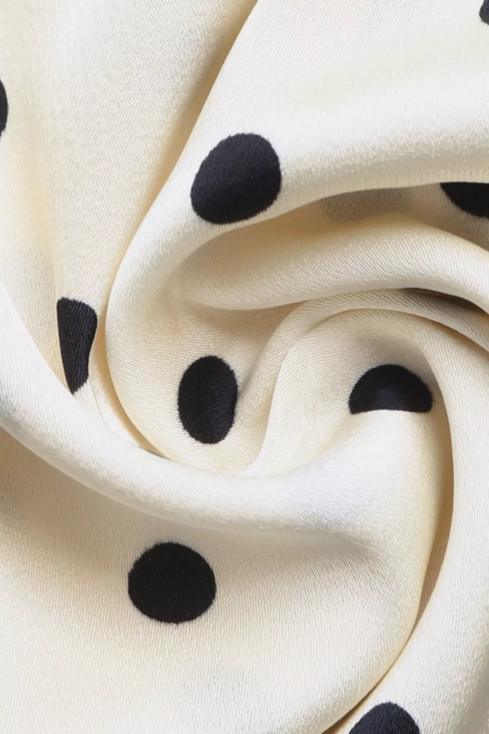Cream polka dot maxi dress fabric detail