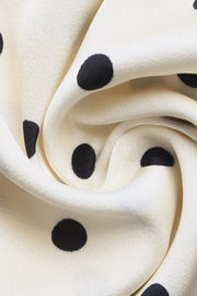 Cream polka dot maxi dress fabric detail