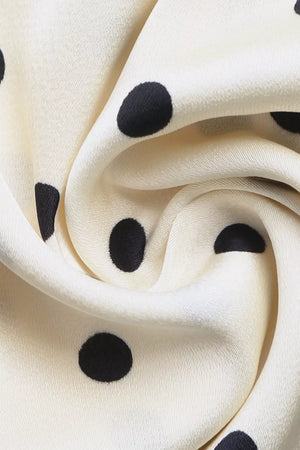 Cream polka dot maxi dress fabric detail