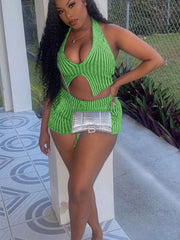 Green knit halter top with cut-out detail and matching shorts ensemble