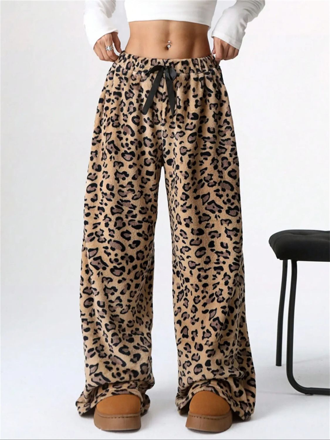 Leopard print lounge palazzo trousers with drawstring waist and wide leg.