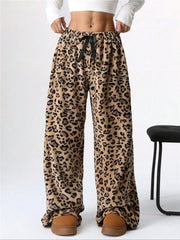 Leopard print lounge palazzo trousers with drawstring waist and wide leg.