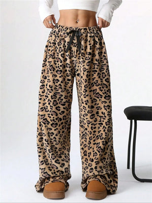 Leopard print lounge palazzo trousers with drawstring waist and wide leg.