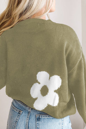Sage acrylic crewneck sweater with a white floral intarsia knit detail on the back.