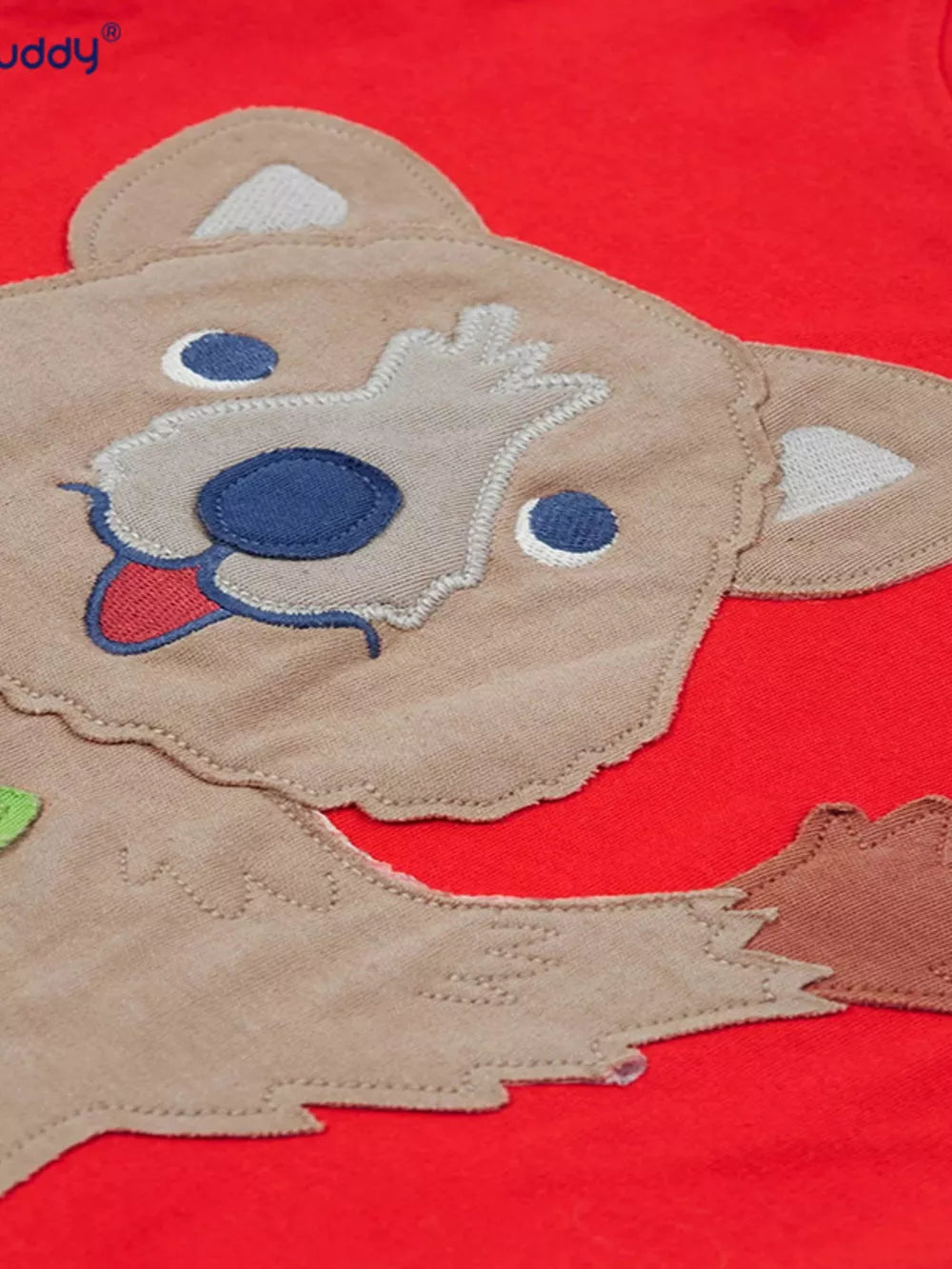 Red cotton t-shirt with a cheerful quokka applique on the front.