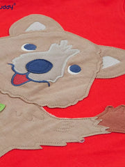Red cotton t-shirt with a cheerful quokka applique on the front.