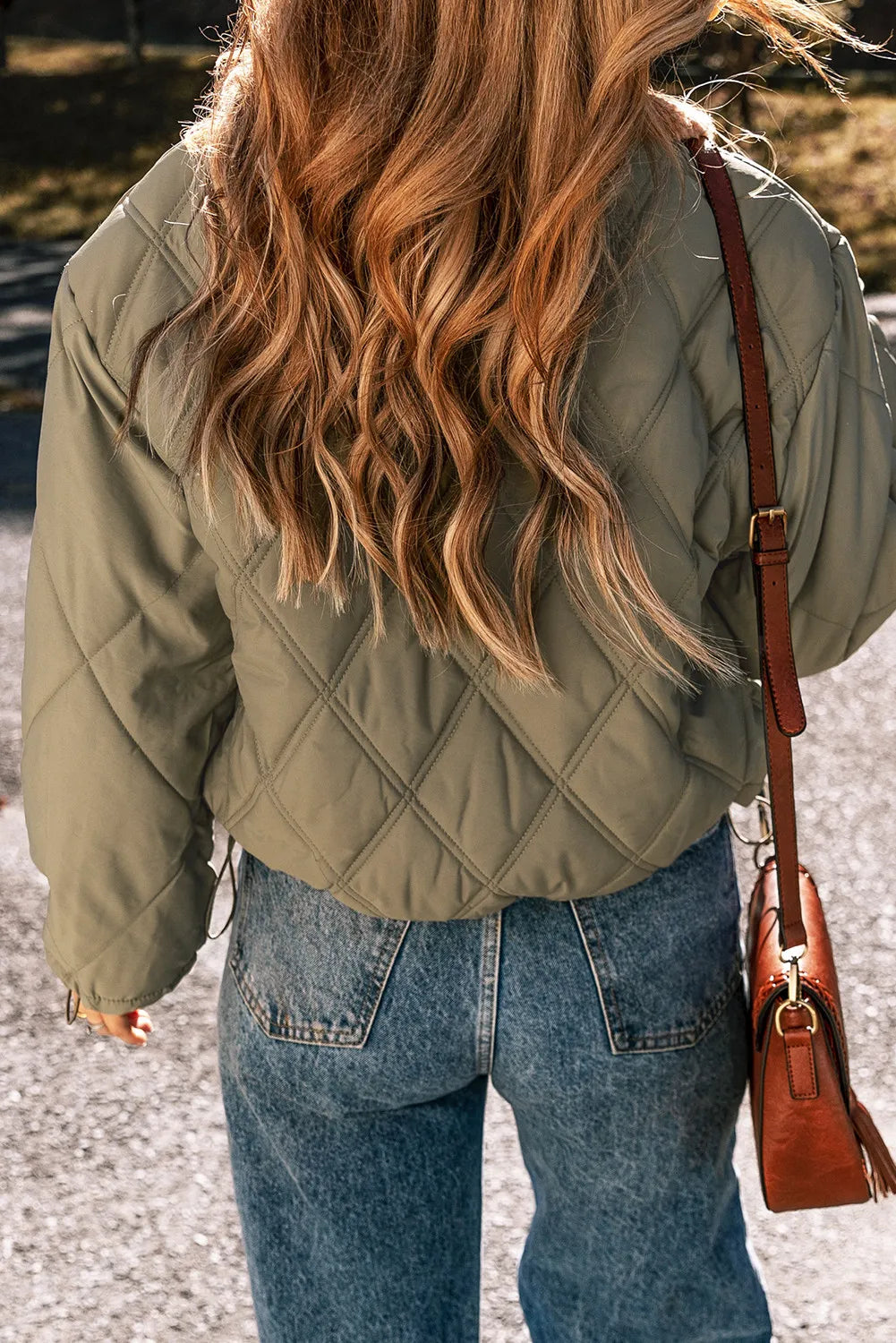 Sage quilted utility jacket with diamond stitching and a shearling collar detail.