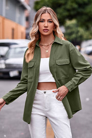 Oversized utility shirt in matcha green with two chest pockets and button cuffs.