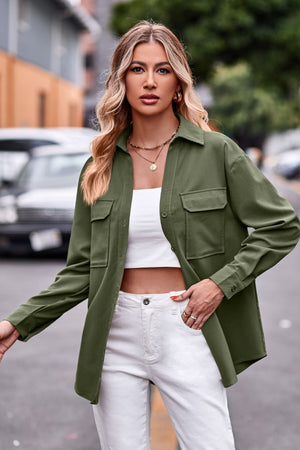 Oversized utility shirt in matcha green with two chest pockets and button cuffs.