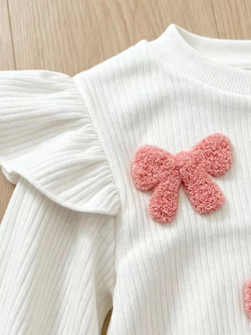 Children's Ruffled Long Sleeve Top And Flare Pants Set in White, side view