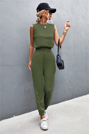 Army green cropped muscle tank and jogger set with padded shoulders and elastic waistband.