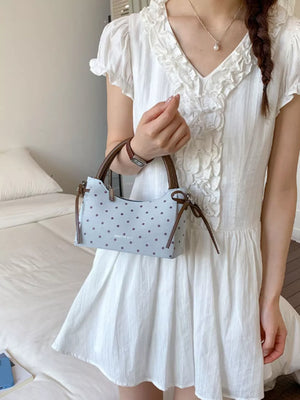 Polka Dot Mini Crossbody Bag in Blue, close-up detail