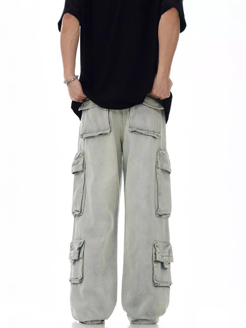 Relaxed fit light blue denim cargo trousers with multiple pockets.