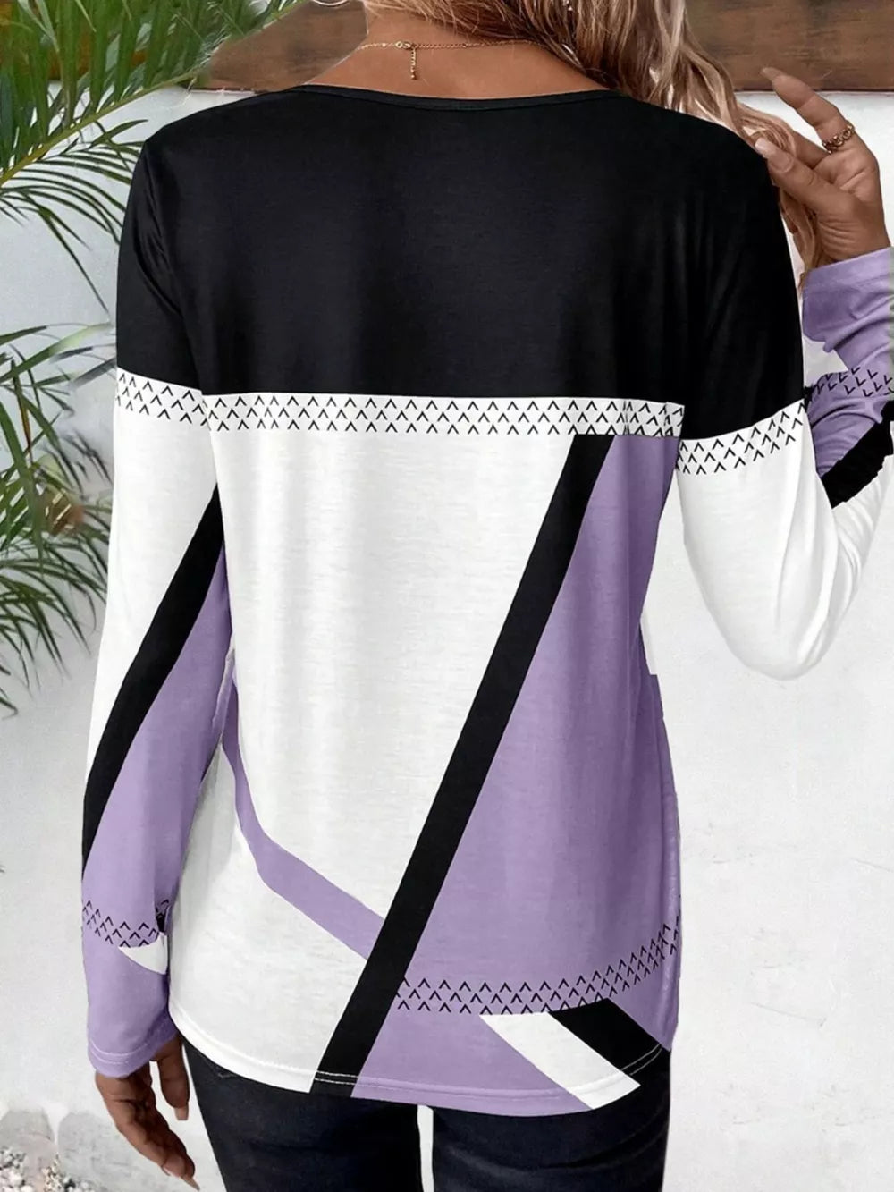 Geometric panel long sleeve maternity t-shirt in lavender, white, and black with a chevron detail.