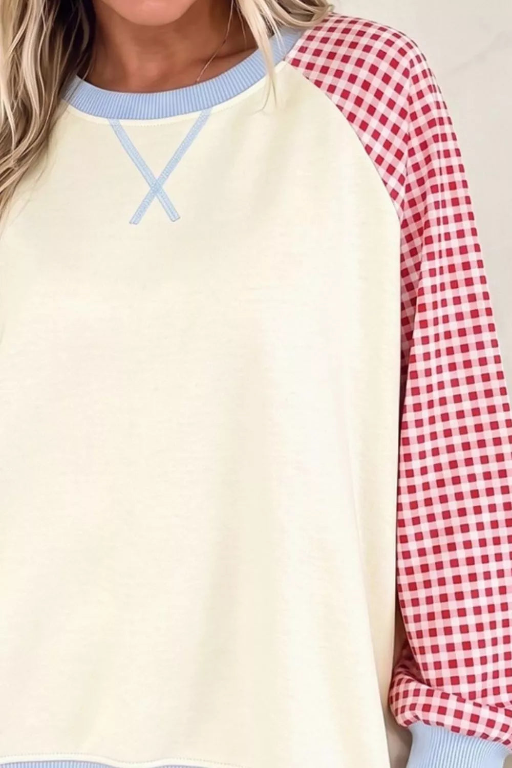 Plaid Raglan Sleeve Sweatshirt in Burnt Coral, close-up detail