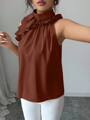 Ruffled high neck sleeveless top in red, black, apricot, or brown.