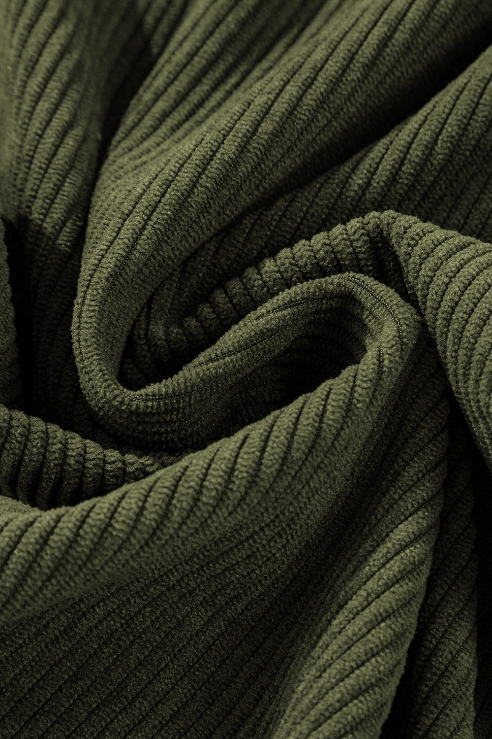 Moss corduroy flared leg trousers fabric detail