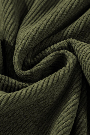 Moss corduroy flared leg trousers fabric detail