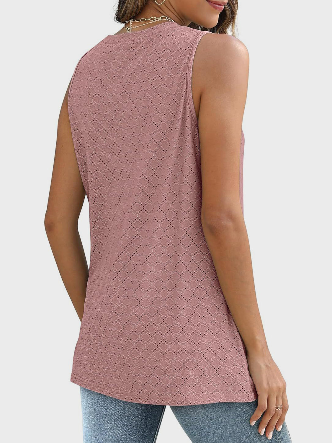 Textured sleeveless shell top in dusty pink with a diamond eyelet pattern