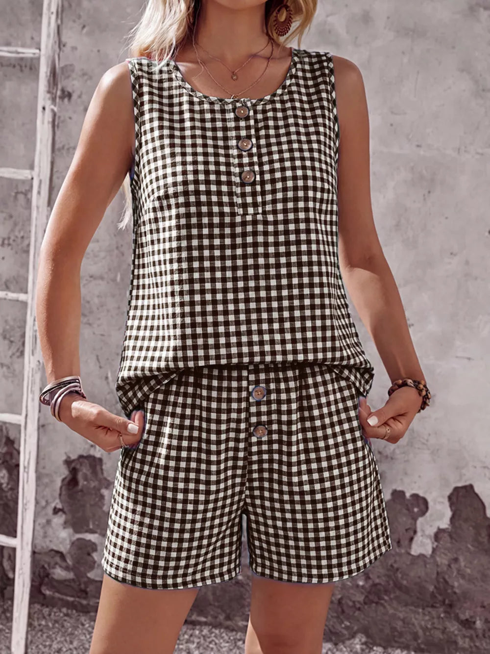 Brown gingham two-piece set with button-down top and shorts.
