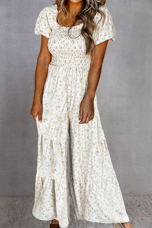 White floral smocked bodice wide-leg jumpsuit with puff sleeves and tiered hem