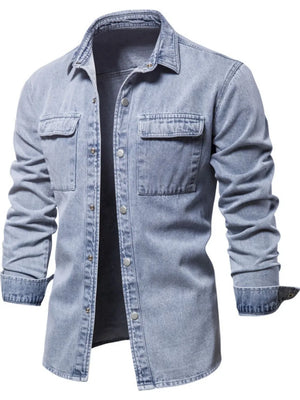 Light faded denim utility shirt jacket with buttoned chest pockets and collar.