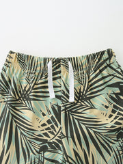 Baby cotton shorts with tropical leaf print and white drawstring waist