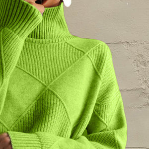 Yellow-green turtleneck sweater with diamond knit texture and ribbed details.