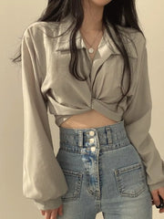 Grey polyester long sleeve shirt with knot front detail and balloon sleeves