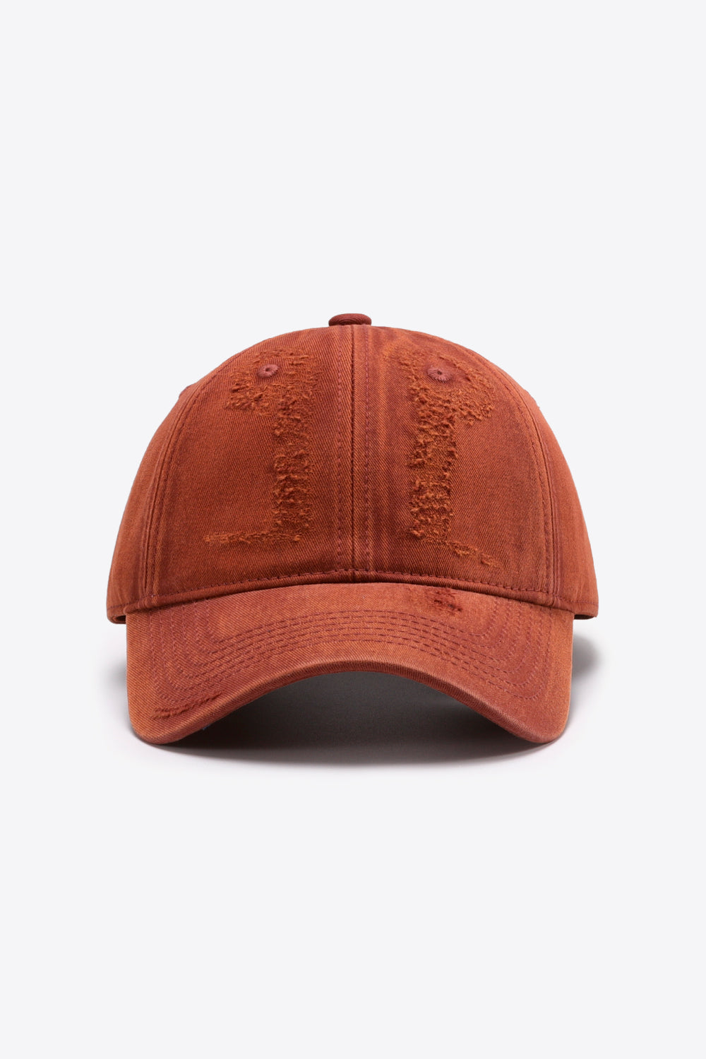 Terracotta distressed baseball cap with embroidered detail