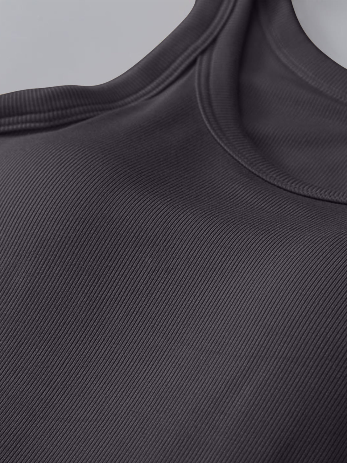 Dark gray ribbed knit tank top with built-in bra detail and scoop neckline.