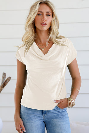 Ivory cowl neck cap-sleeve tee with a soft, textured fabric.