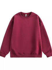 Oversized crew-neck sweatshirt in wine red with ribbed cuffs and hem.