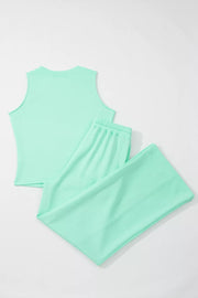 Sleek mint green drawstring lounge set with sleeveless top and wide-leg pants.