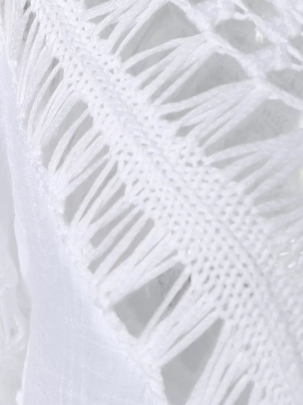 White crochet-trimmed flowy cover-up with fringe detail