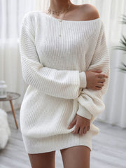 White acrylic sweater dress with off-shoulder neckline and balloon sleeves