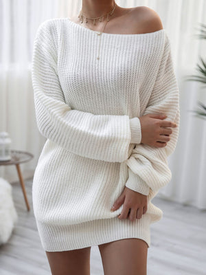 White acrylic sweater dress with off-shoulder neckline and balloon sleeves