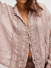 Dusty Pink linen button-down blouse with vertical ruffles and button front.