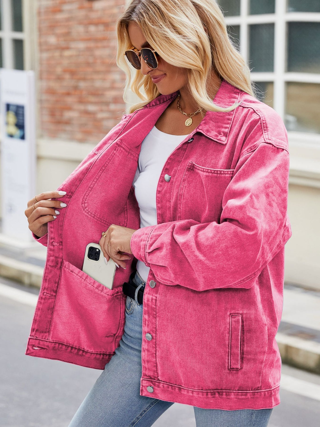 Fuchsia denim oversized shacket with button-down front and chest pockets.